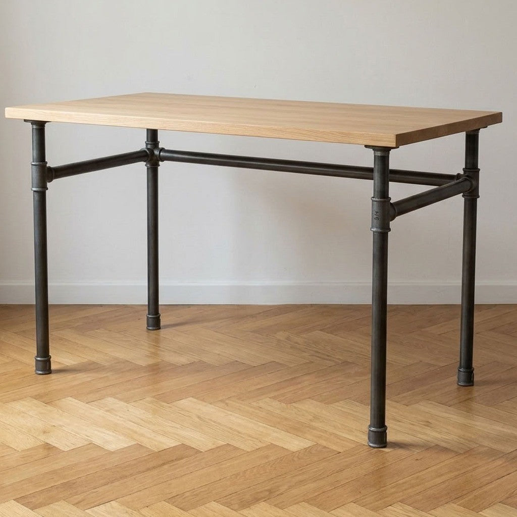 Scrivania industriale con piano in rovere chiaro su base a U in ghisa e acciaio Ø 34 mm, ambientazione (piano non incluso)