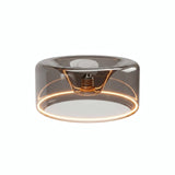 Lampadina LED donut E27 in vetro fumé, Ø 195 mm, accesa, anello luminoso caldo, sfondo bianco