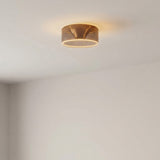 Lampadina LED donut E27 in vetro fumé, Ø 195 mm, accesa a soffitto in una stanza dalle pareti chiare
