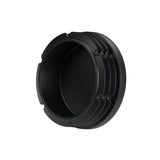 Tappo a lamelle nero per raccordo femmina 1″1/4 33x42, vista dal basso: corpo cavo e lamelle