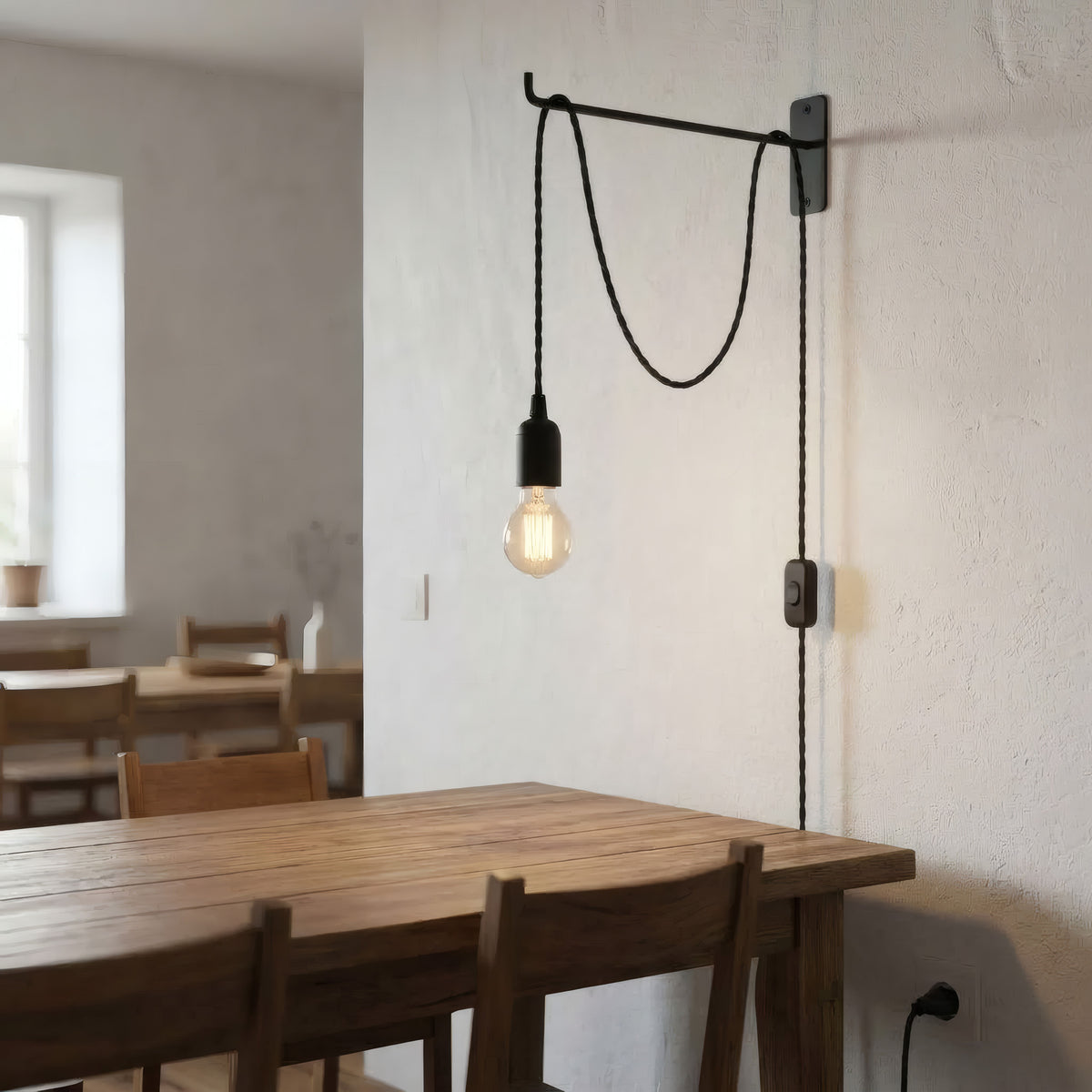 Lampada a sospensione con cavo tessile intrecciato, ambientazione