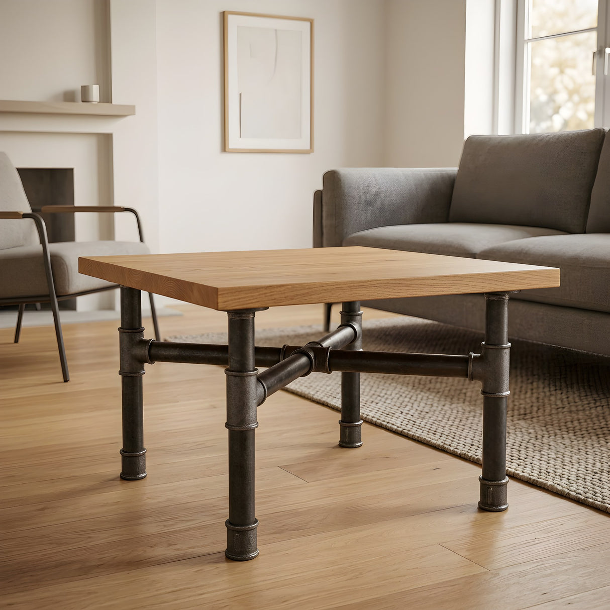 Base per tavolino, ghisa e acciaio verniciato, a croce Ø 34 mm, in ambiente sotto un piano in rovere massello chiaro