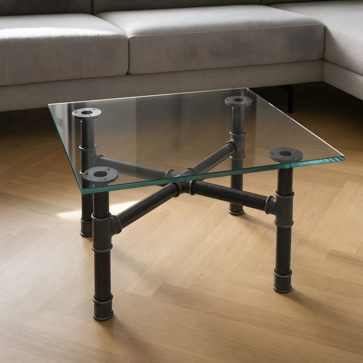 Base per tavolino, ghisa e acciaio verniciato, a croce Ø 34 mm, in ambiente sotto un piano in vetro temperato